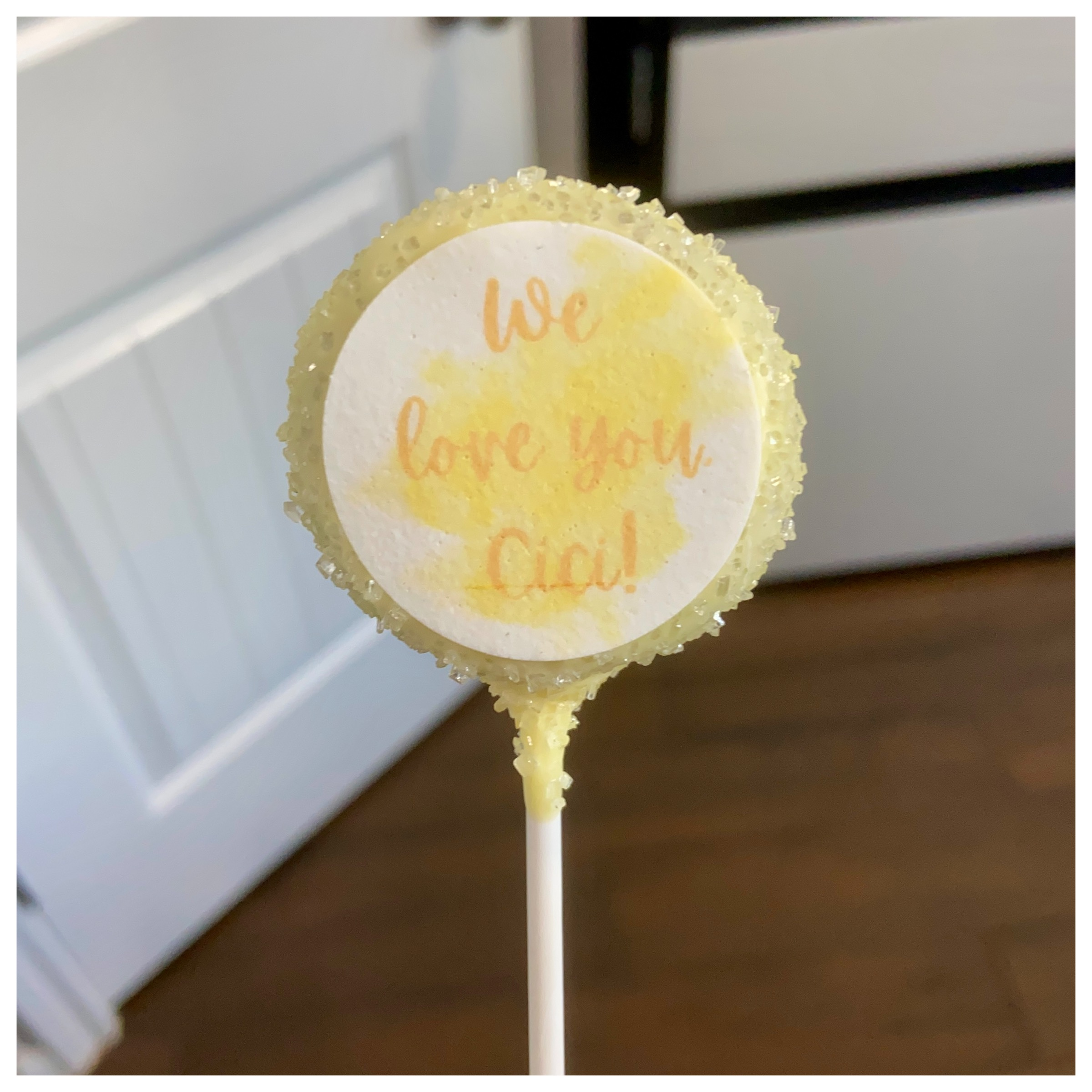 Custom edible images cake pops to match a yellow custom order